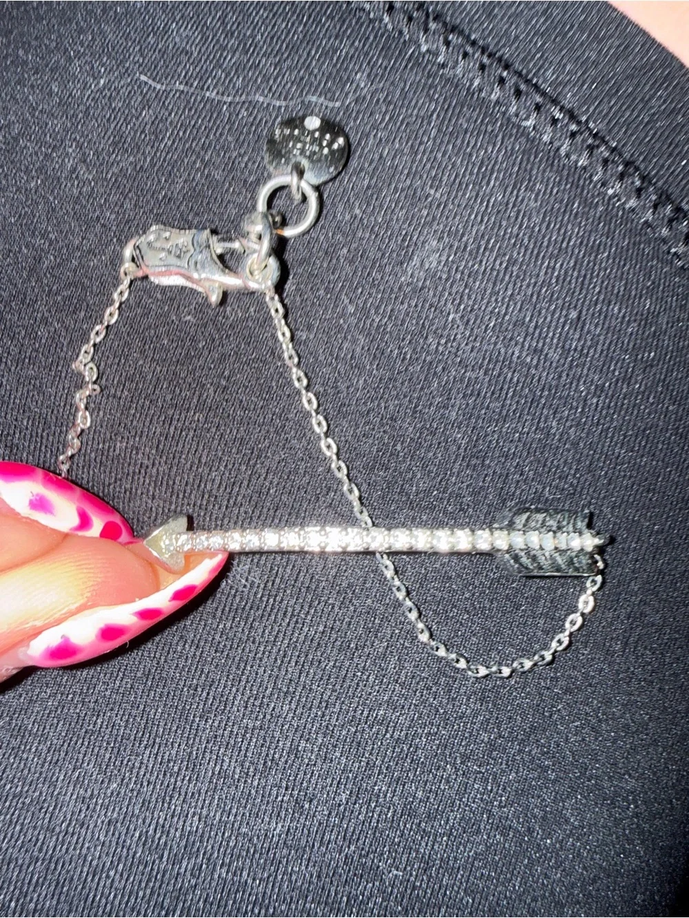 Juicy Couture silver tone arrow bracelet with crystal accents